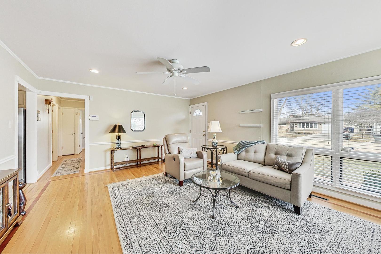 1016 Midway Road Northbrook, IL 60062 - Photo 3 of 27 a living room with furniture and a table
