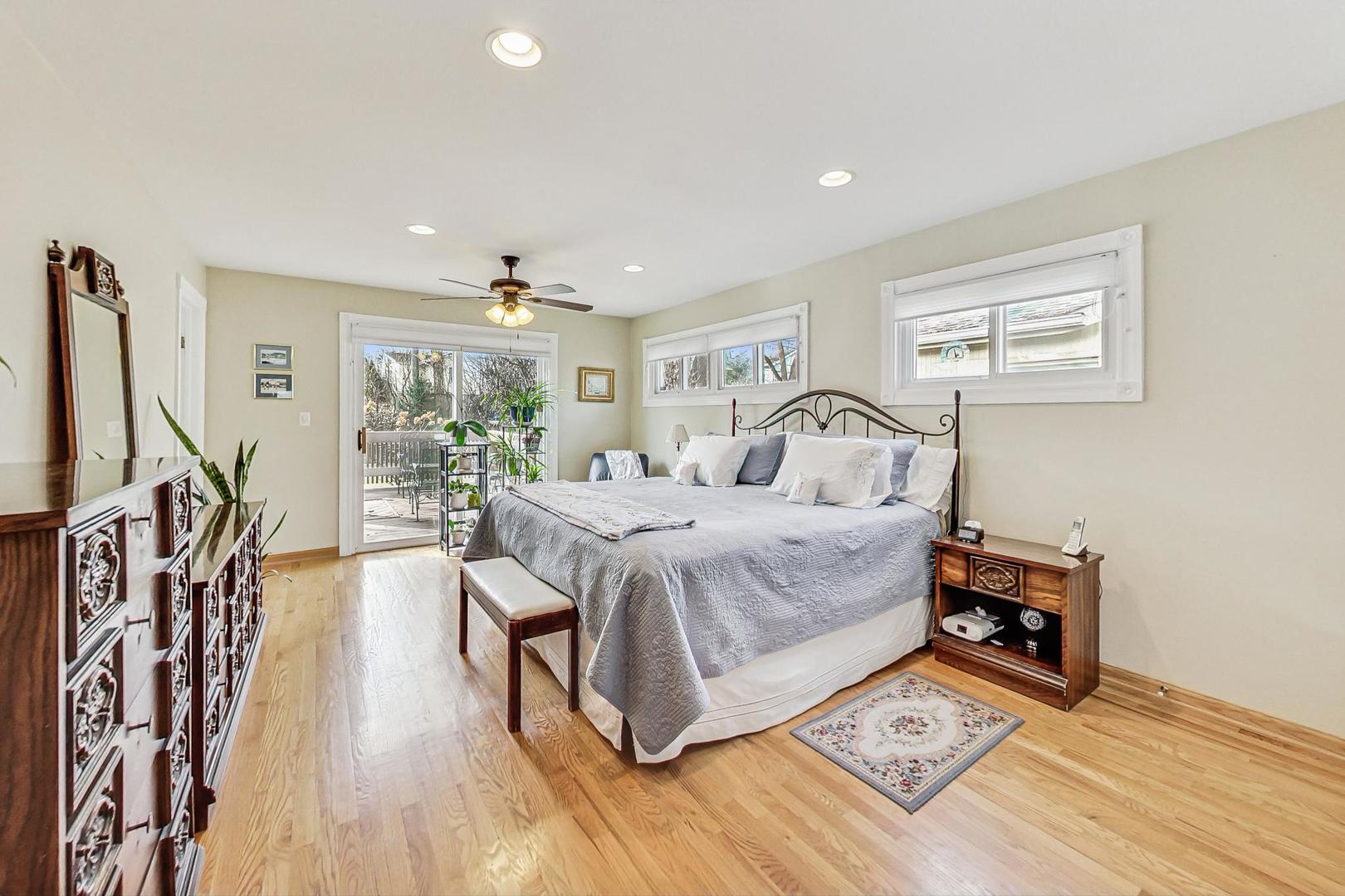 1016 Midway Road Northbrook, IL 60062 - Photo 9 of 27 a bedroom with furniture and wooden floor