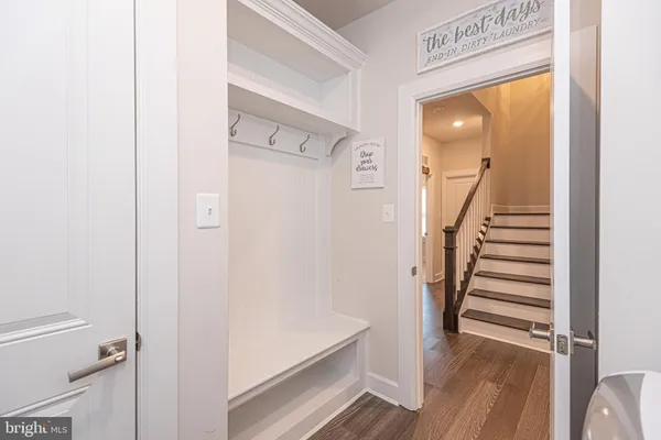a bathroom with a sink vanity and a mirror