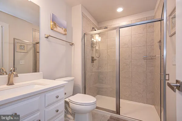 a bathroom with a sink double vanity and a tub