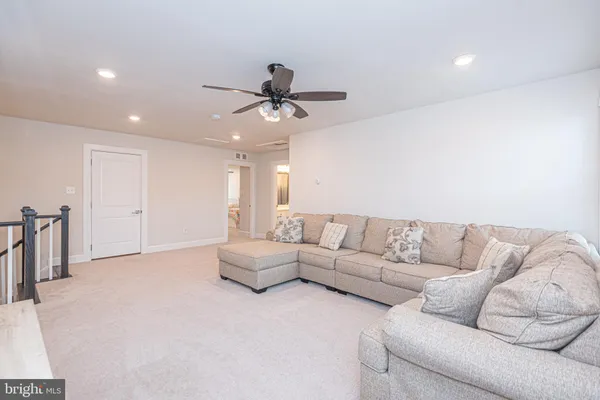 a view of a brick house with a large window