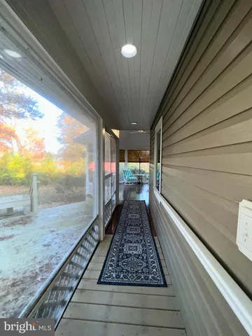 a view of back yard from a balcony