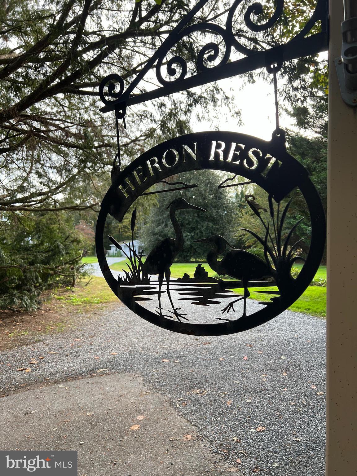 28701 Edgemere Road Easton, MD 21601 - Photo 2 of 39 a view of a swimming pool with a sitting space