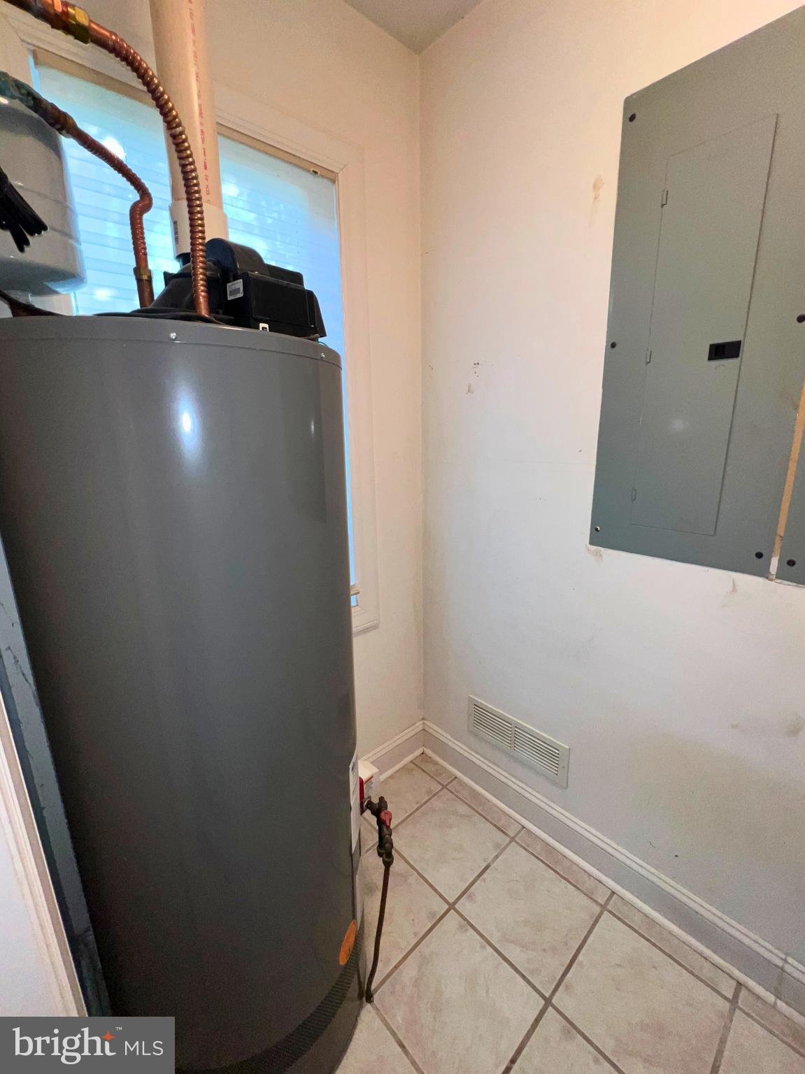 28701 Edgemere Road Easton, MD 21601 - Photo 25 of 39 a view of water heater room