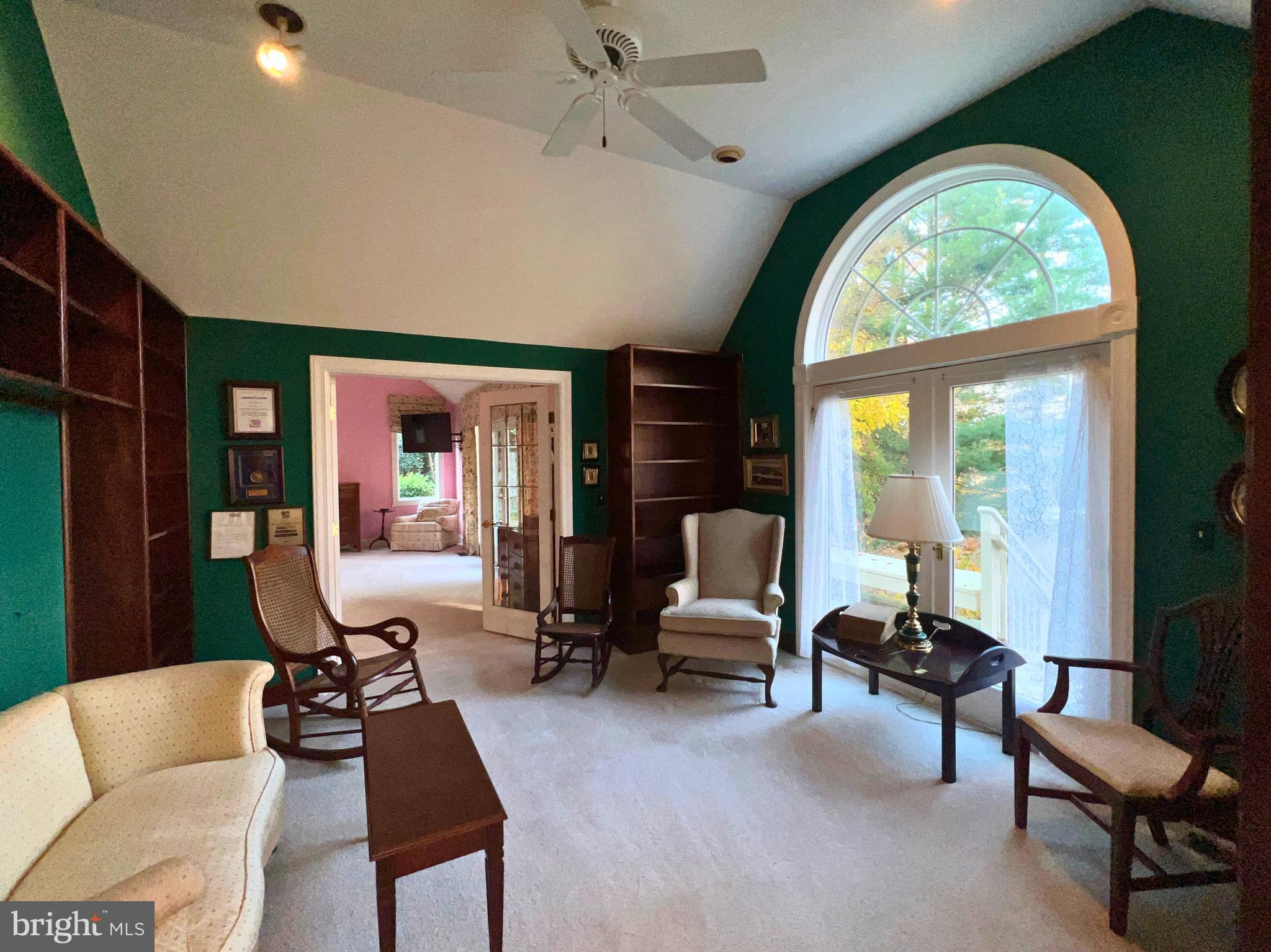 28701 Edgemere Road Easton, MD 21601 - Photo 26 of 39 a living room with furniture and a large window
