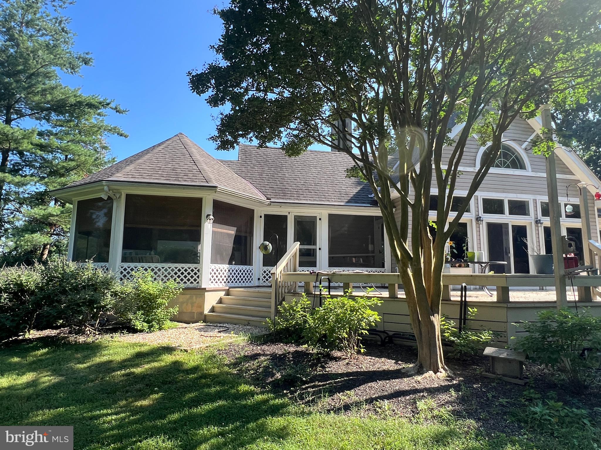 28701 Edgemere Road Easton, MD 21601 - Photo 31 of 39 a front view of a house with a yard