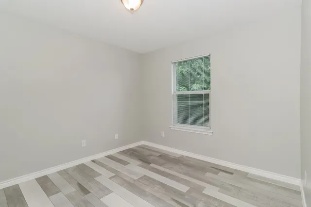 a view of a room that has a window in it