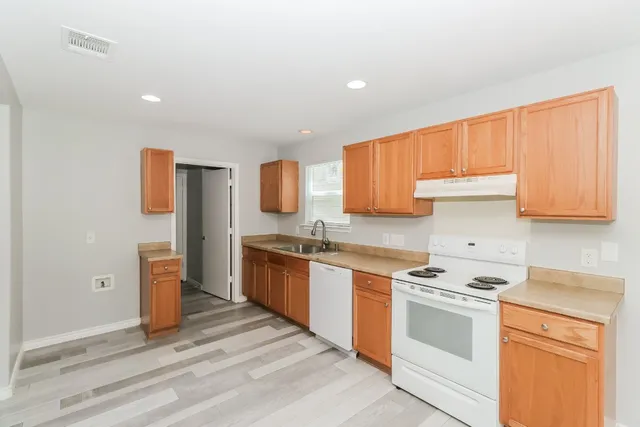 a view of a room with a large window