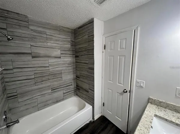 a bathroom with a bathtub