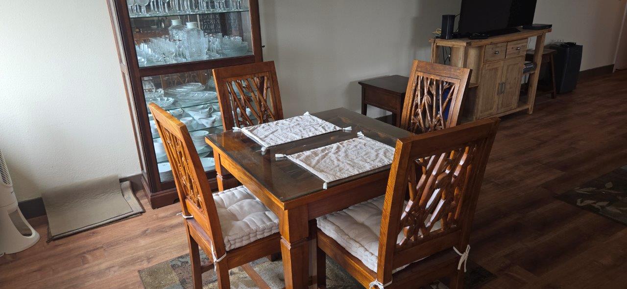 84 Pukihae Street, Unit PH6 Hilo, HI 96720 - Photo 15 of 29 a view of an outdoor dining space with seating area