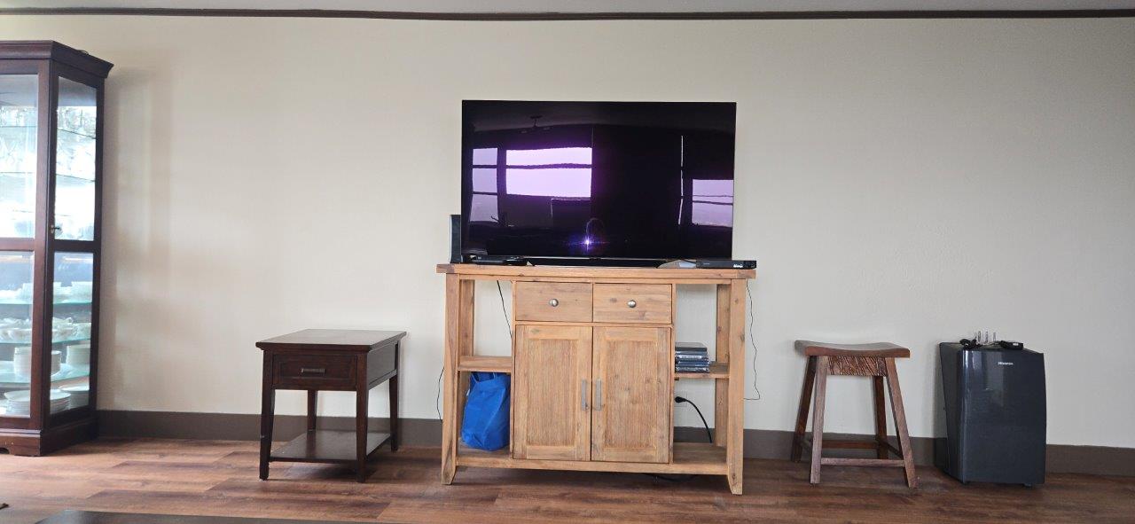 84 Pukihae Street, Unit PH6 Hilo, HI 96720 - Photo 17 of 29 a view of living room with wooden floor and furniture