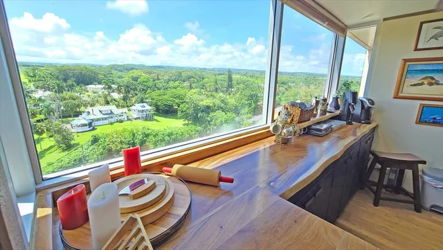 a room with wooden floor and furniture