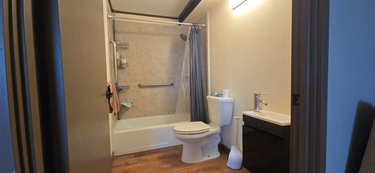 84 Pukihae Street, Unit PH6 Hilo, HI 96720 - Photo 22 of 29 a bathroom with a toilet and a shower