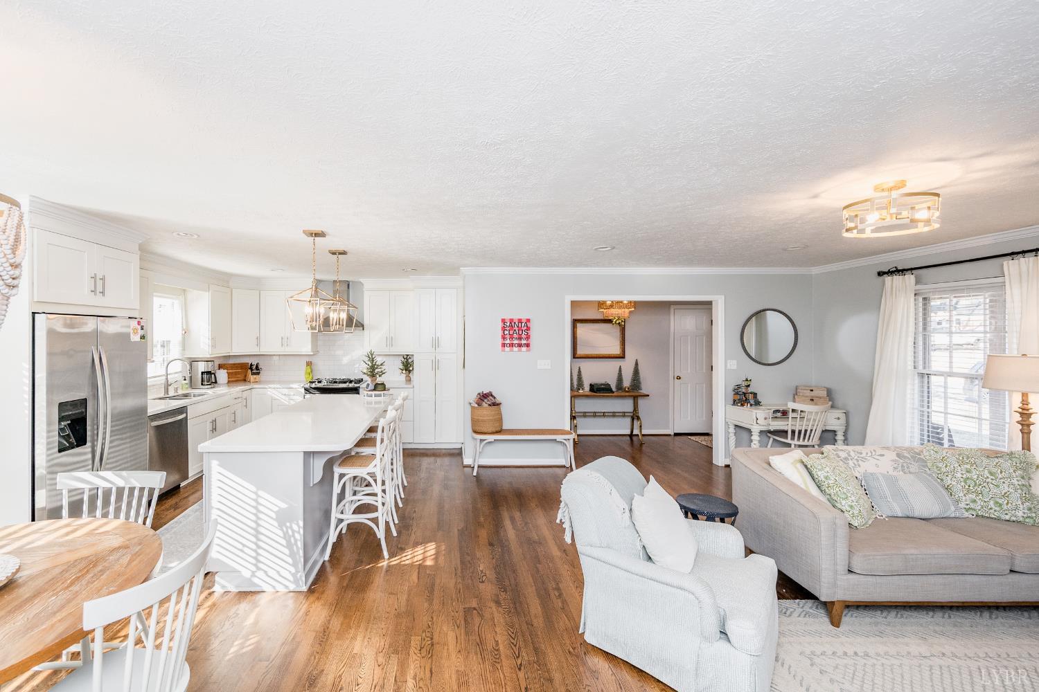 5152 Wedgewood Road Lynchburg, VA 24503 - Photo 12 of 70 a living room with furniture and a wooden floor