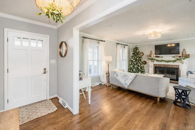 a bedroom with a bed window and a table in it