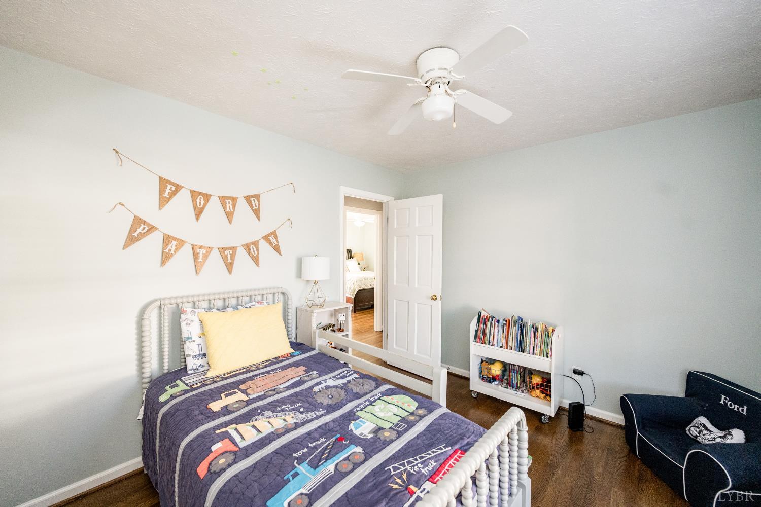 5152 Wedgewood Road Lynchburg, VA 24503 - Photo 17 of 70 a bedroom with a bed and a book shelf