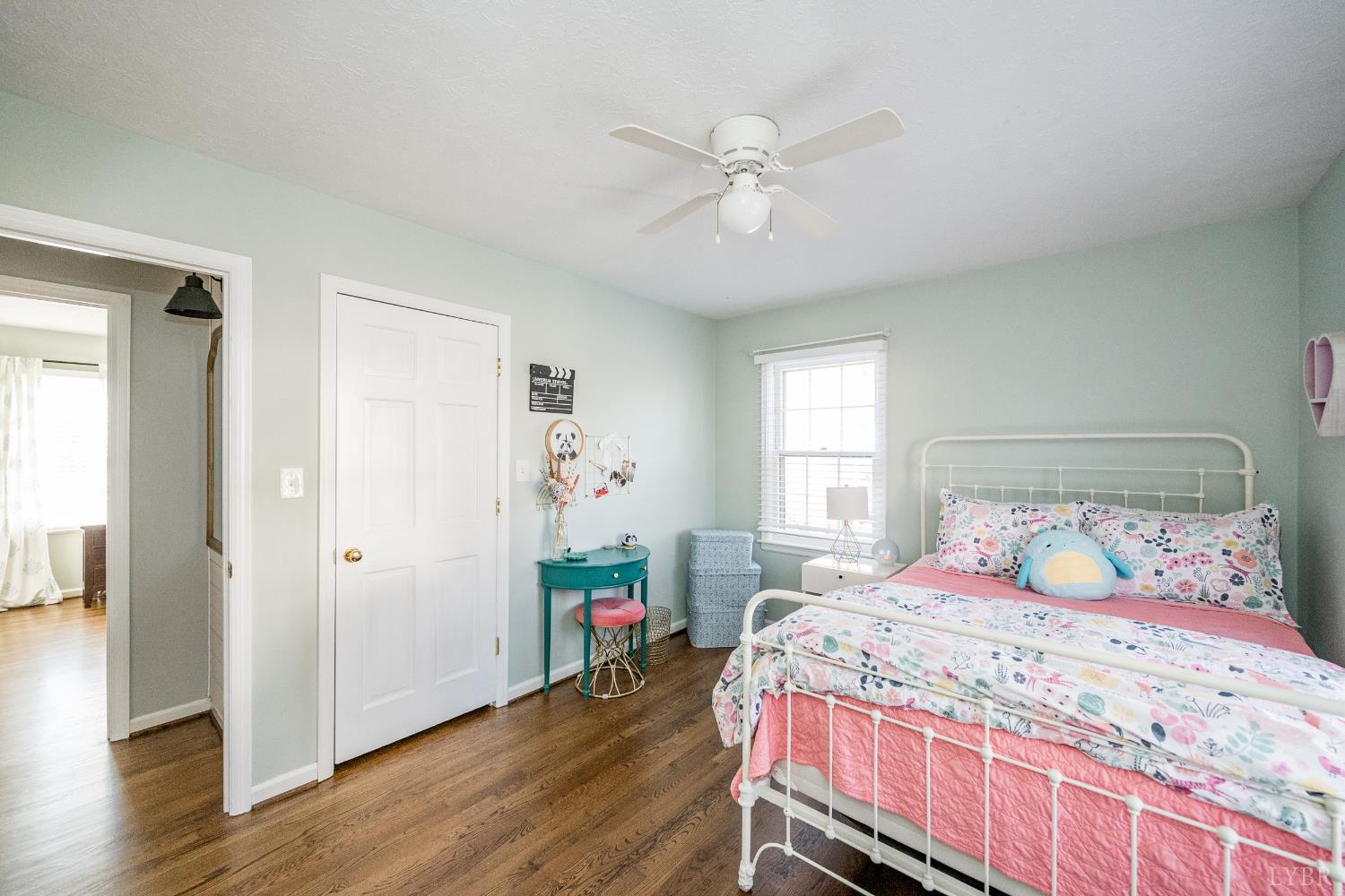 5152 Wedgewood Road Lynchburg, VA 24503 - Photo 20 of 70 a bedroom with a bed and wooden floor
