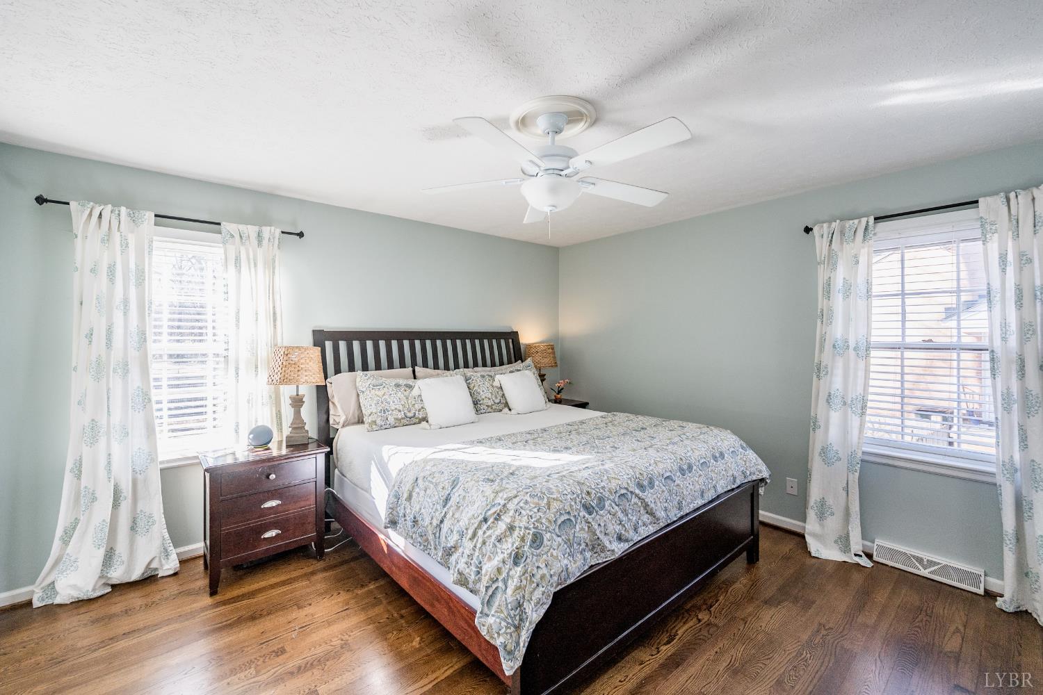 5152 Wedgewood Road Lynchburg, VA 24503 - Photo 21 of 70 a bedroom with a bed and wooden floor