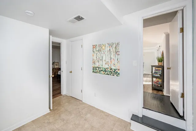 a view of house with a yard