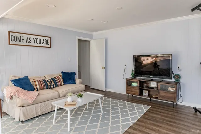 a view of a yard with wooden fence