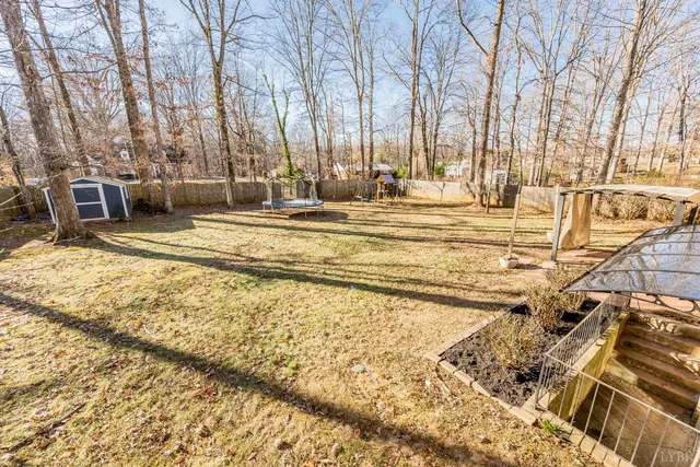 a view of a pathway with a yard