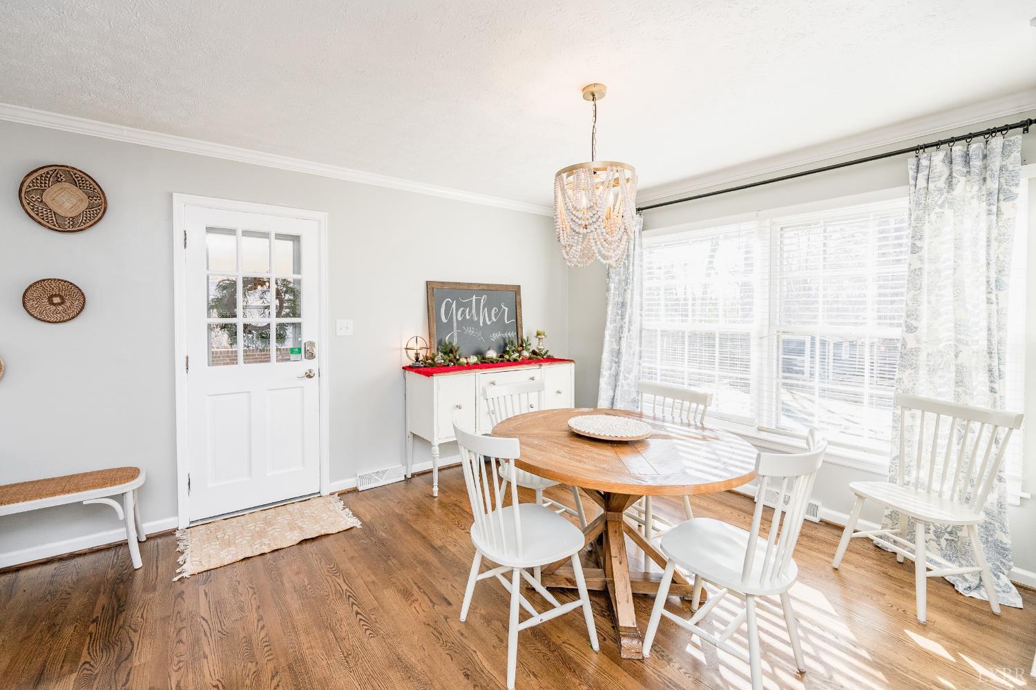 5152 Wedgewood Road Lynchburg, VA 24503 - Photo 10 of 70 a view of a dining room with furniture and wooden floor