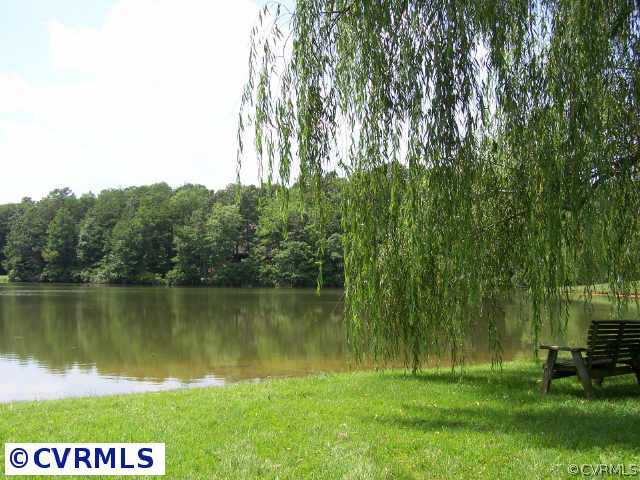 600 Fords Road Manakin Sabot, VA 23103 - Photo 10 of 10 a view of a lake with a big yard