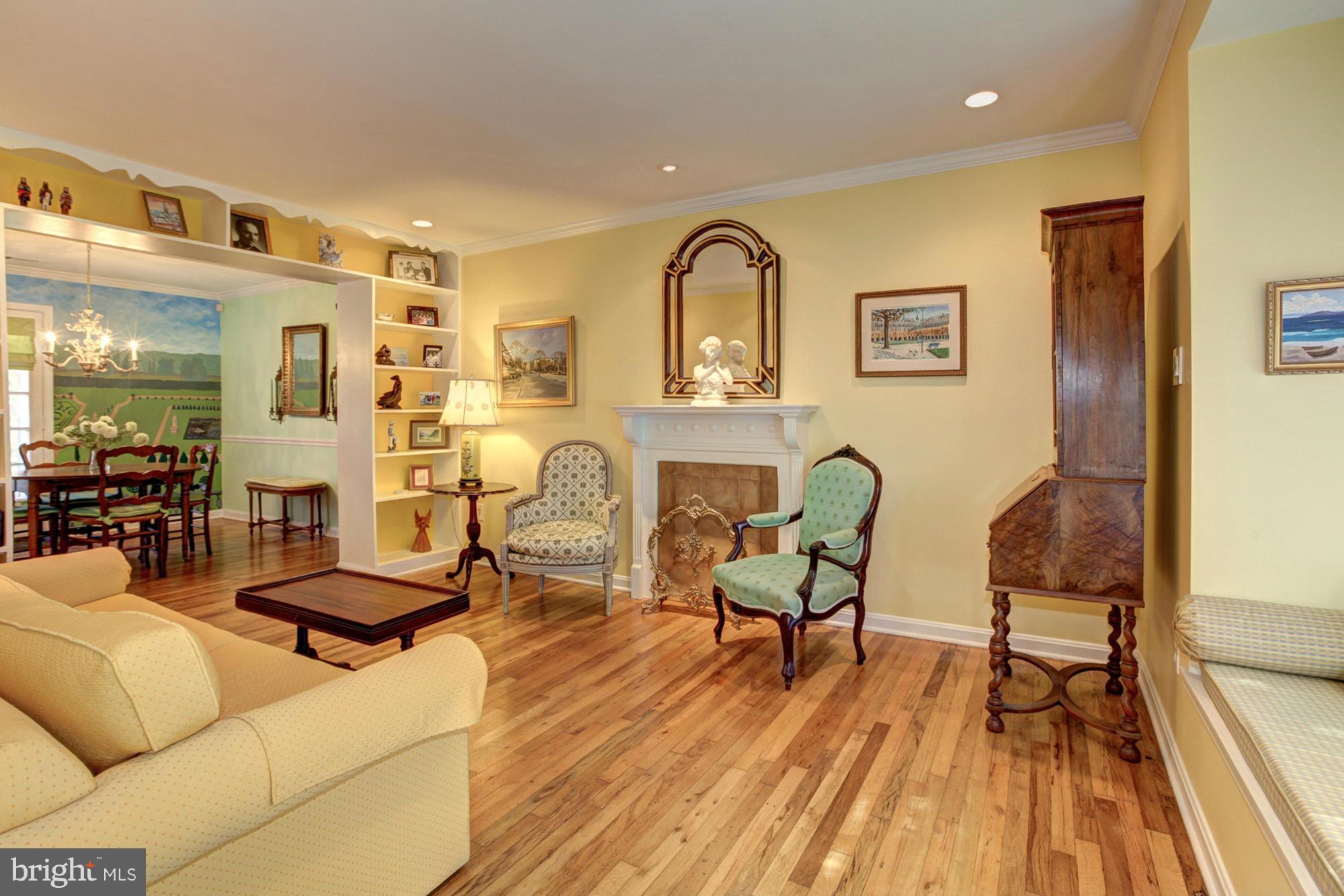 6637 Fairfax Road, Unit 105 Chevy Chase, MD 20815 - Photo 4 of 30 Living Room with Decorative Fireplace