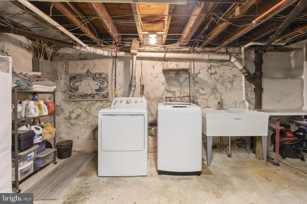 a utility room with dryer and washer