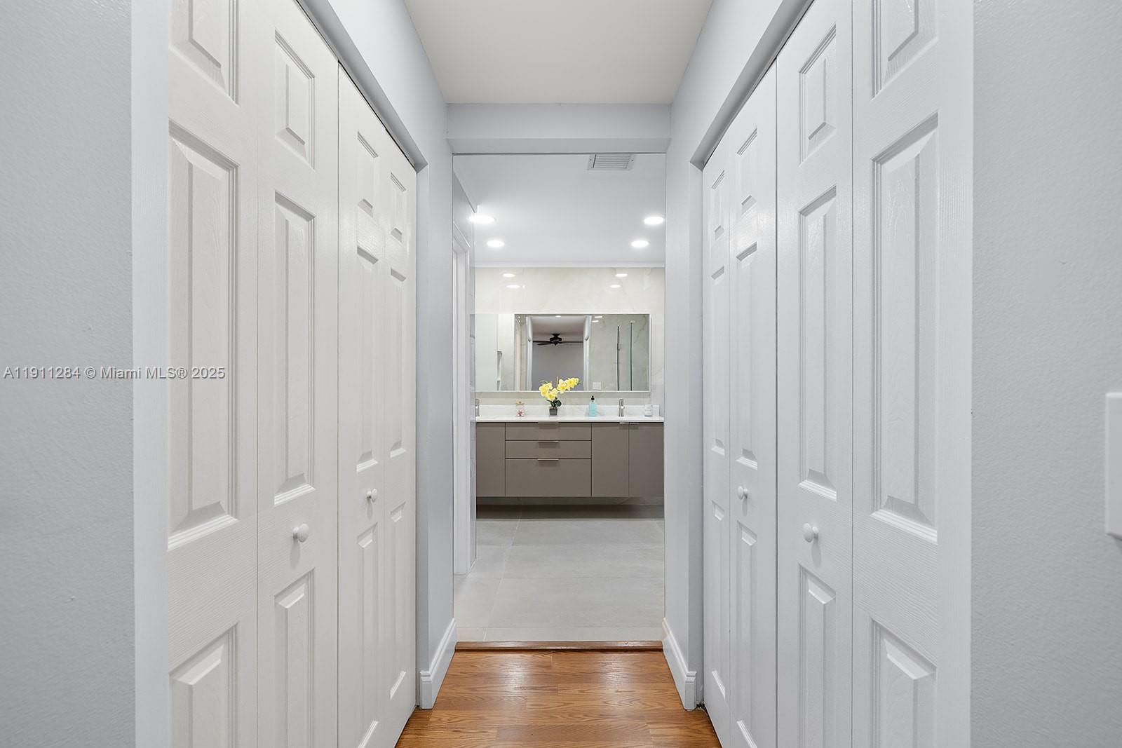 16296 Southwest 26th Street Miramar, FL 33027 - Photo 24 of 48 a bathroom with a sink and mirror