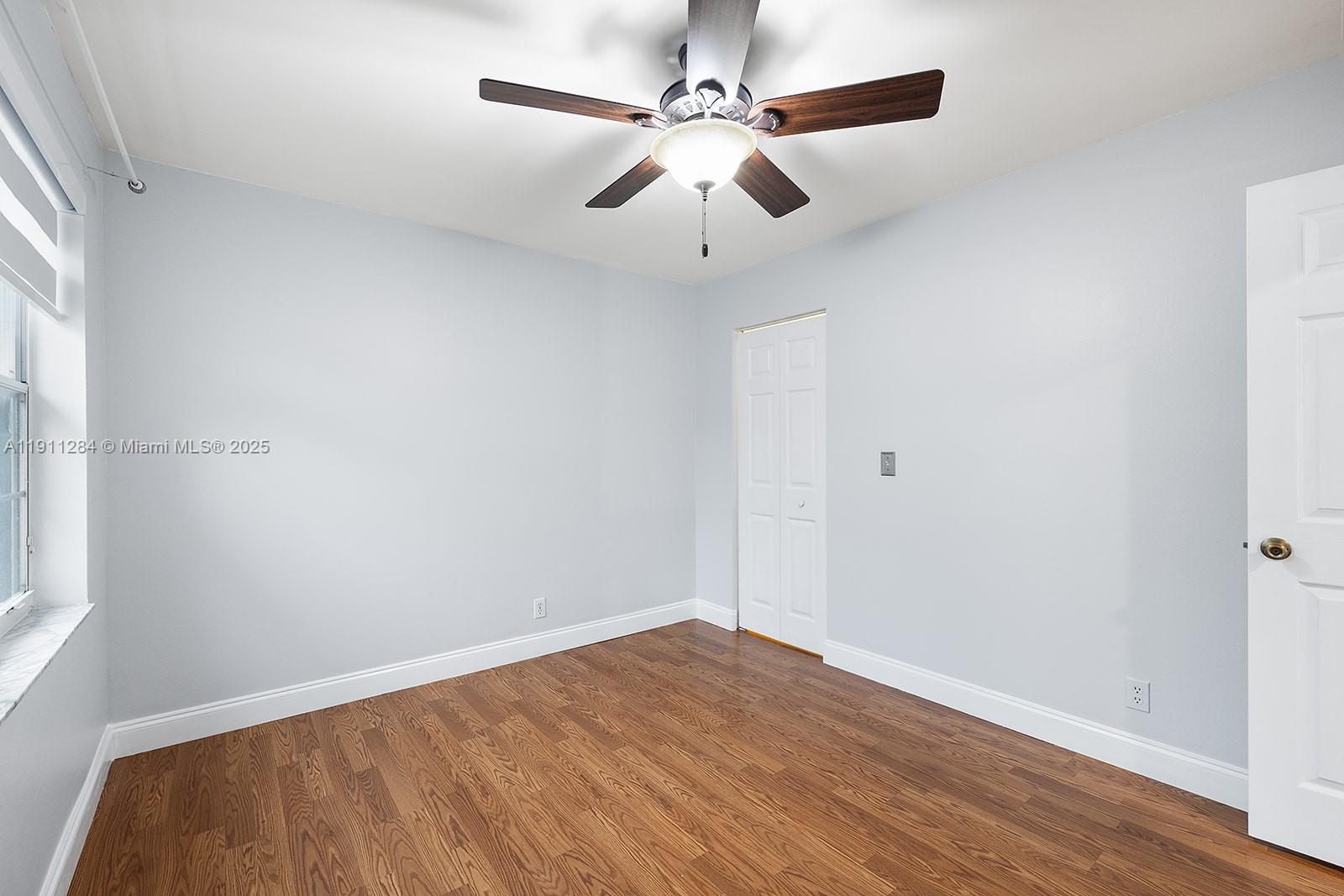 16296 Southwest 26th Street Miramar, FL 33027 - Photo 36 of 48 an empty room with fan and windows