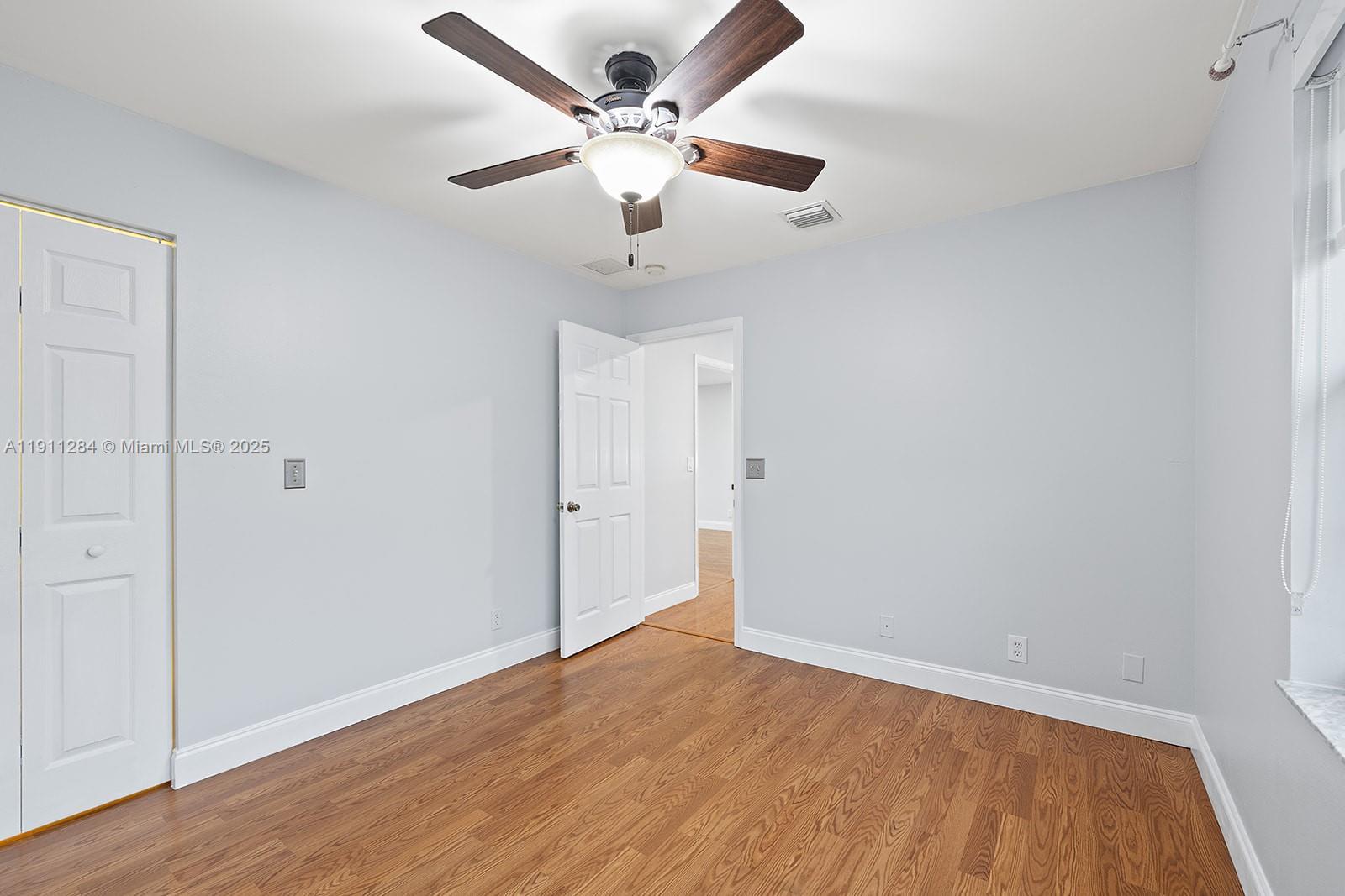 16296 Southwest 26th Street Miramar, FL 33027 - Photo 37 of 48 wooden floor in an empty room