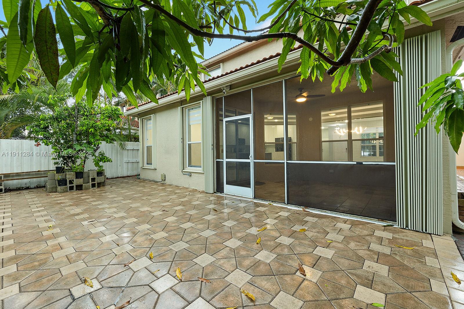 16296 Southwest 26th Street Miramar, FL 33027 - Photo 44 of 48 a view of front door and yard