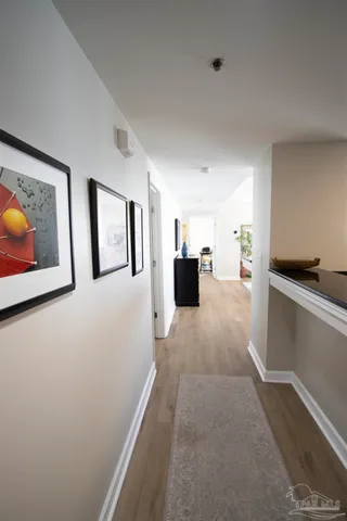 a view of kitchen with furniture and wooden floor