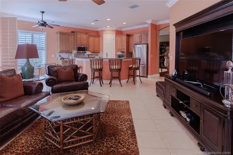 a bathroom with a tub a sink and mirror