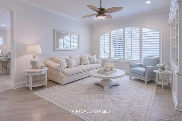 a living room with furniture and a window
