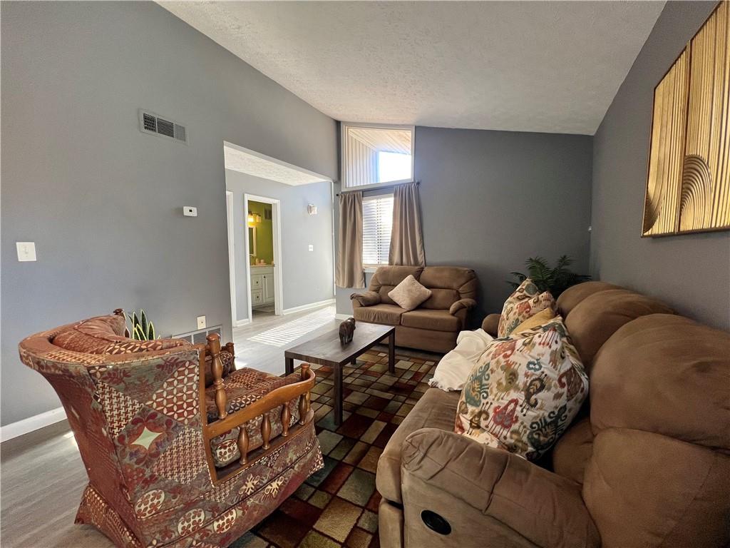 1496 Pine Log Road Northeast, Unit A Conyers, GA 30012 - Photo 15 of 24 a living room with furniture