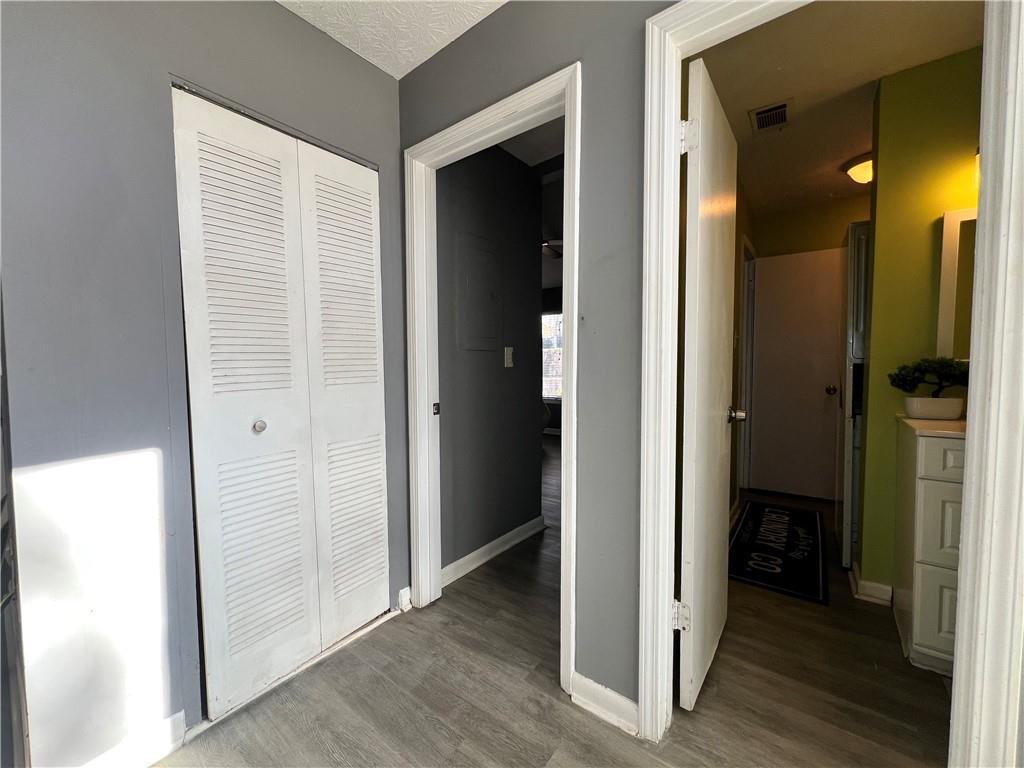 1496 Pine Log Road Northeast, Unit A Conyers, GA 30012 - Photo 5 of 24 wooden floor in a gallery