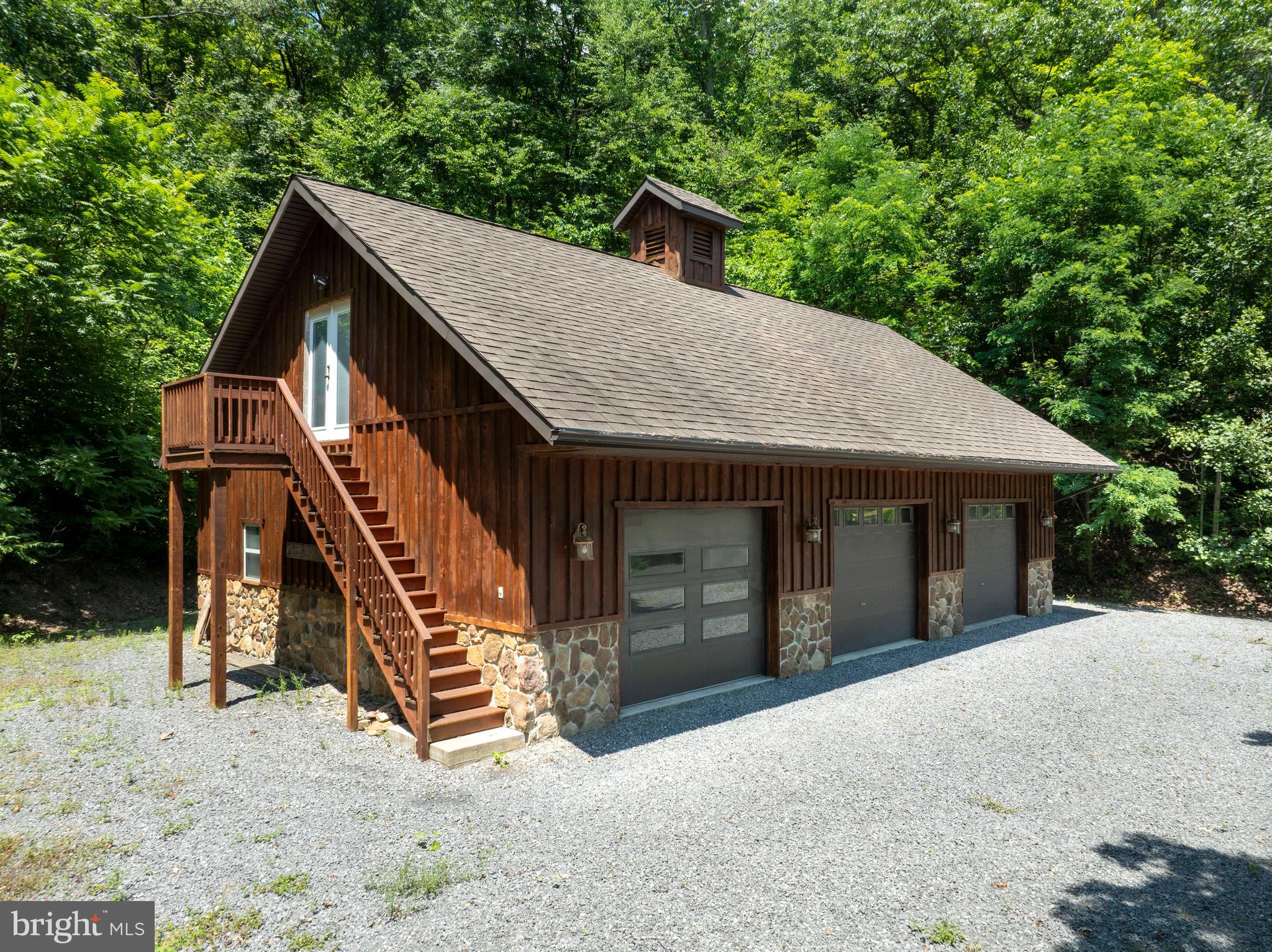1400 Jacks Mountain Road McVeytown, PA 17051 - Photo 105 of 129 a view of a house with a yard and wooden fence
