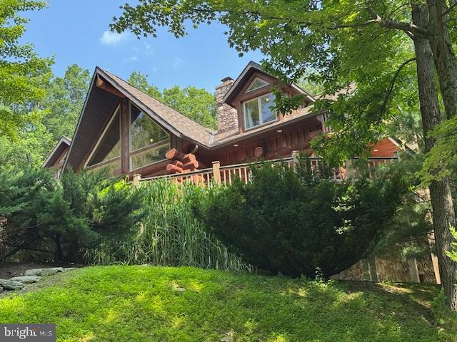 1400 Jacks Mountain Road McVeytown, PA 17051 - Photo 125 of 129 a backyard of a house with lots of green space