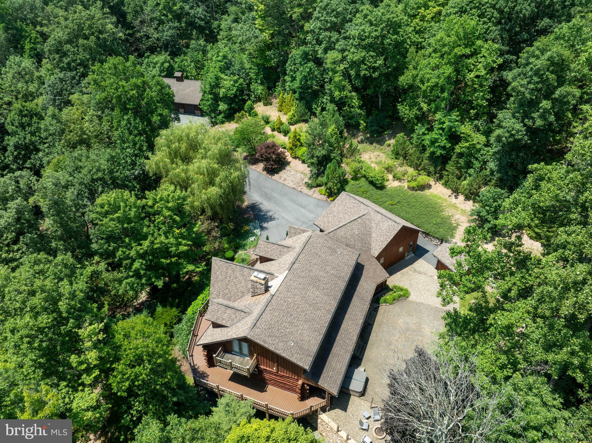 1400 Jacks Mountain Road McVeytown, PA 17051 - Photo 2 of 129 an aerial view of a house with yard and outdoor seating