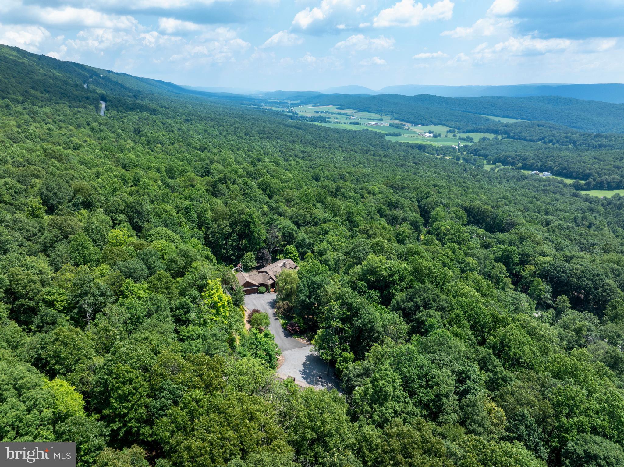 1400 Jacks Mountain Road McVeytown, PA 17051 - Photo 25 of 129 an aerial view of residential houses with outdoor space and trees