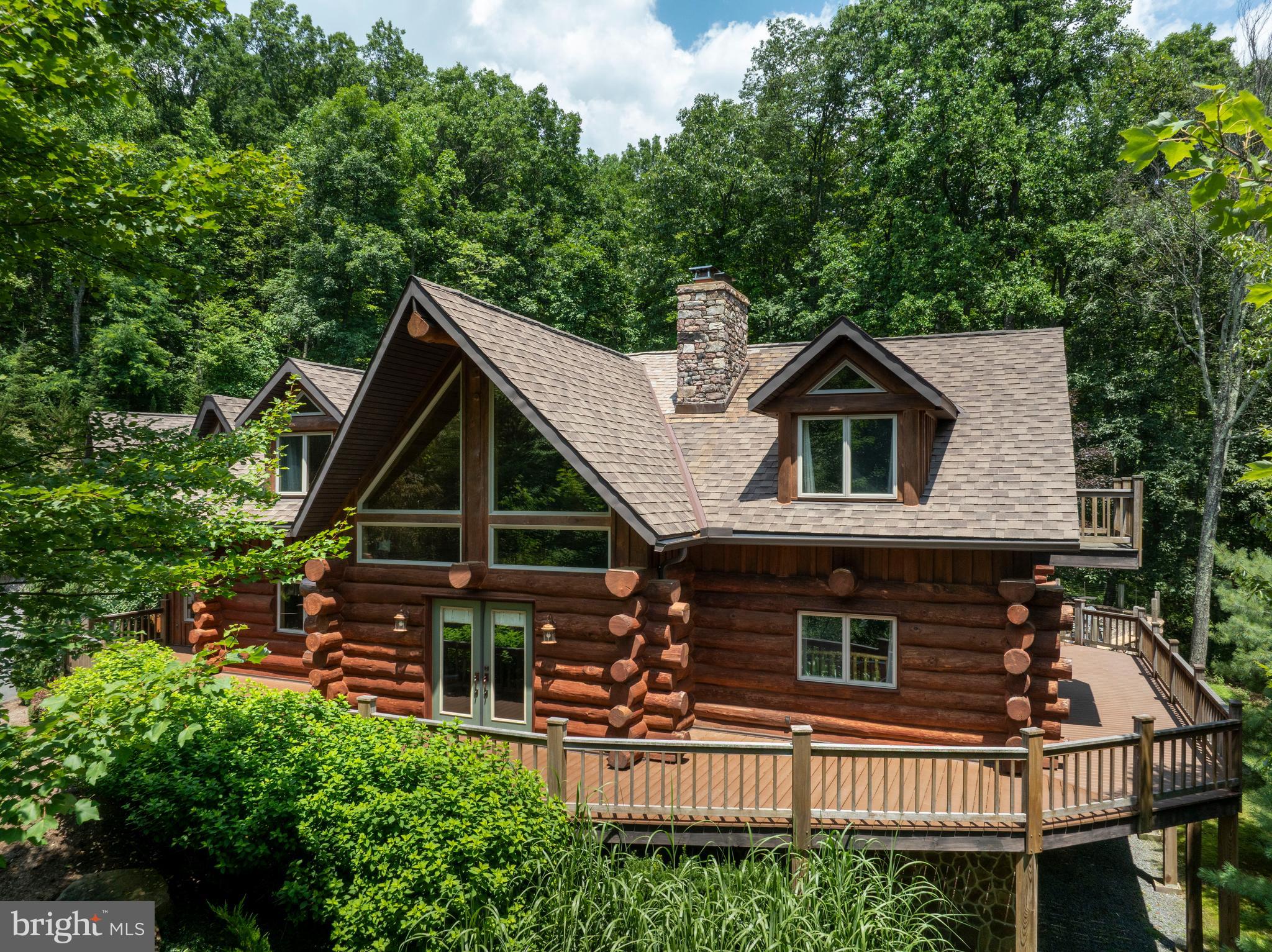 1400 Jacks Mountain Road McVeytown, PA 17051 - Photo 3 of 129 a front view of a house with a yard