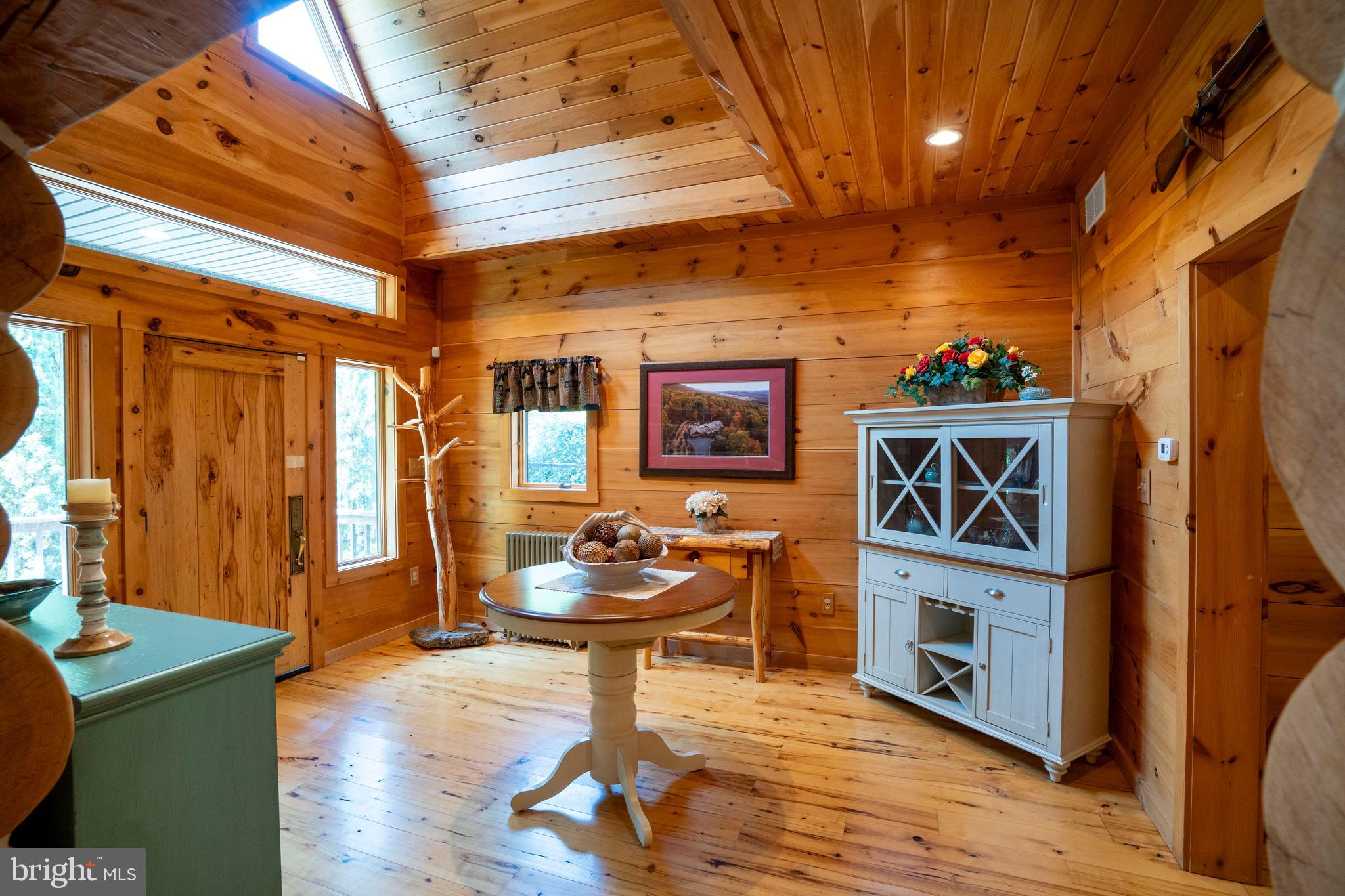 1400 Jacks Mountain Road McVeytown, PA 17051 - Photo 34 of 129 a living room with furniture and a wooden floor