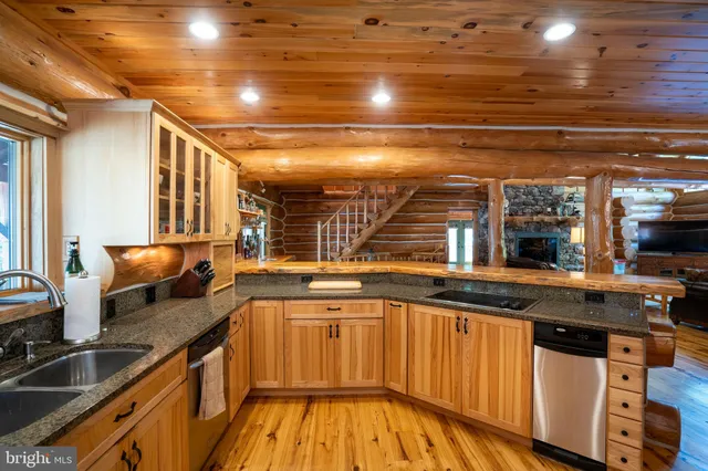 a bed room with a bed and a flat screen tv