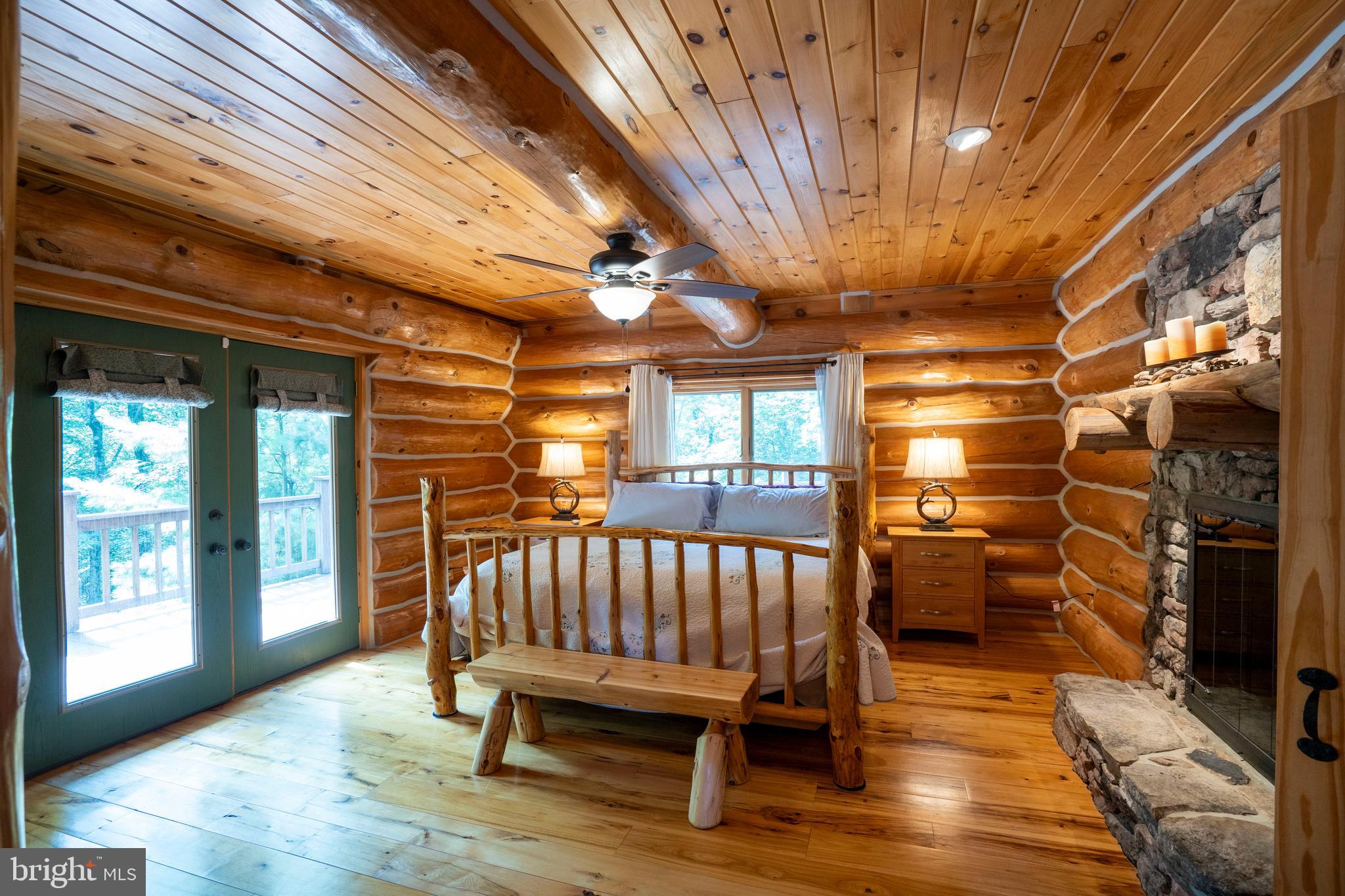 1400 Jacks Mountain Road McVeytown, PA 17051 - Photo 59 of 129 a view of a room with furniture wooden floor and windows