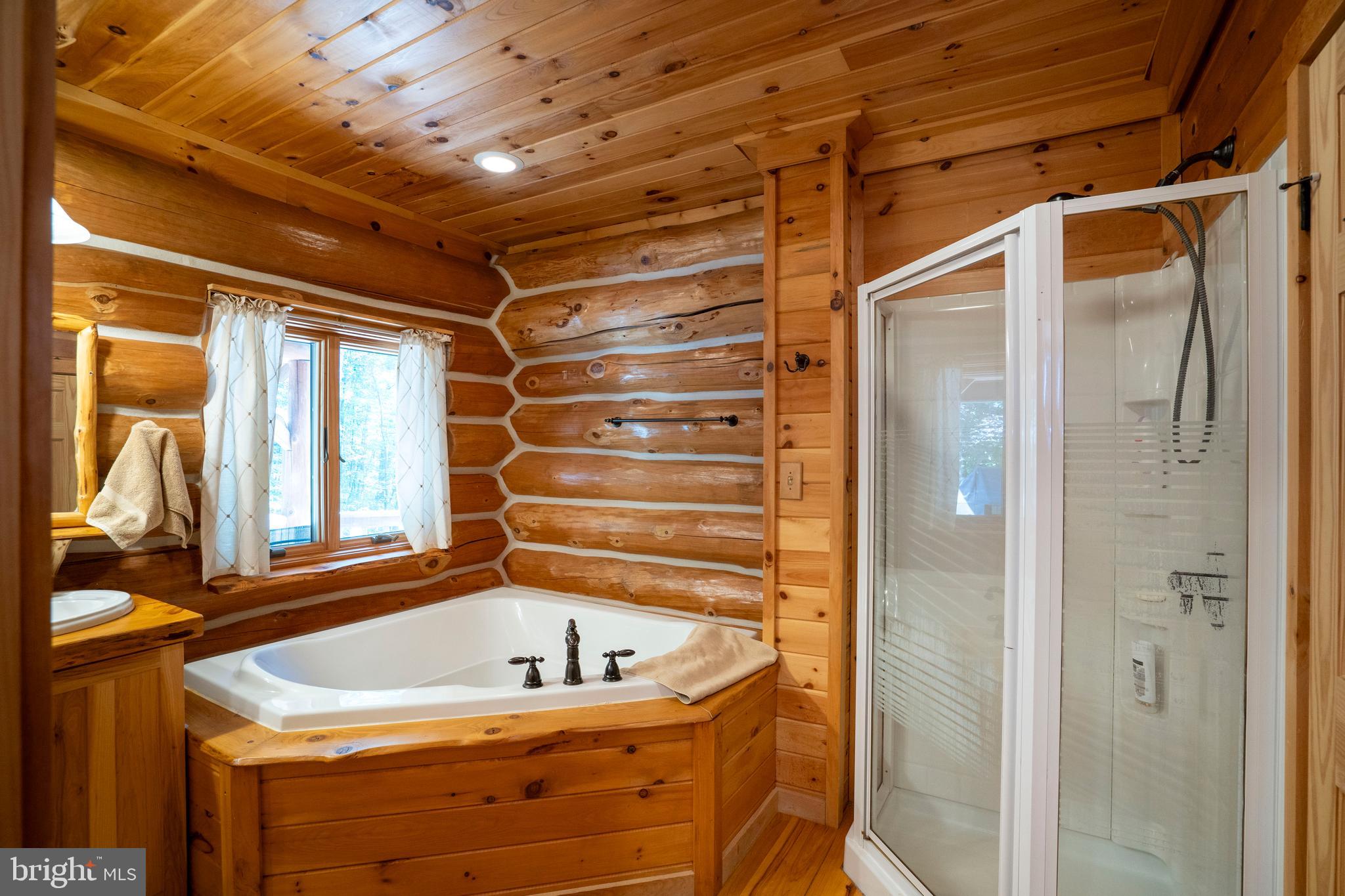 1400 Jacks Mountain Road McVeytown, PA 17051 - Photo 63 of 129 a bathroom with a tub and shower