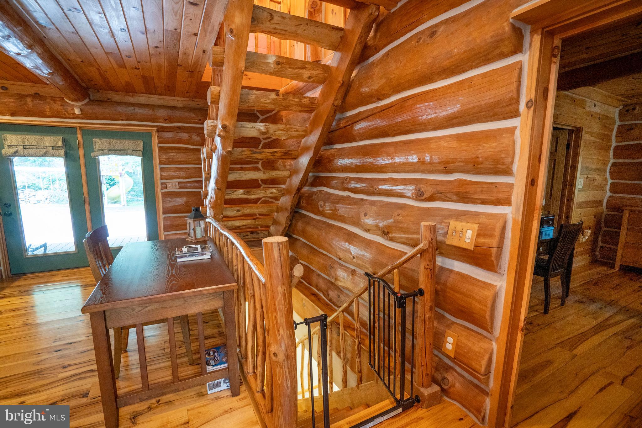 1400 Jacks Mountain Road McVeytown, PA 17051 - Photo 89 of 129 a view of an entryway with wooden floor and door