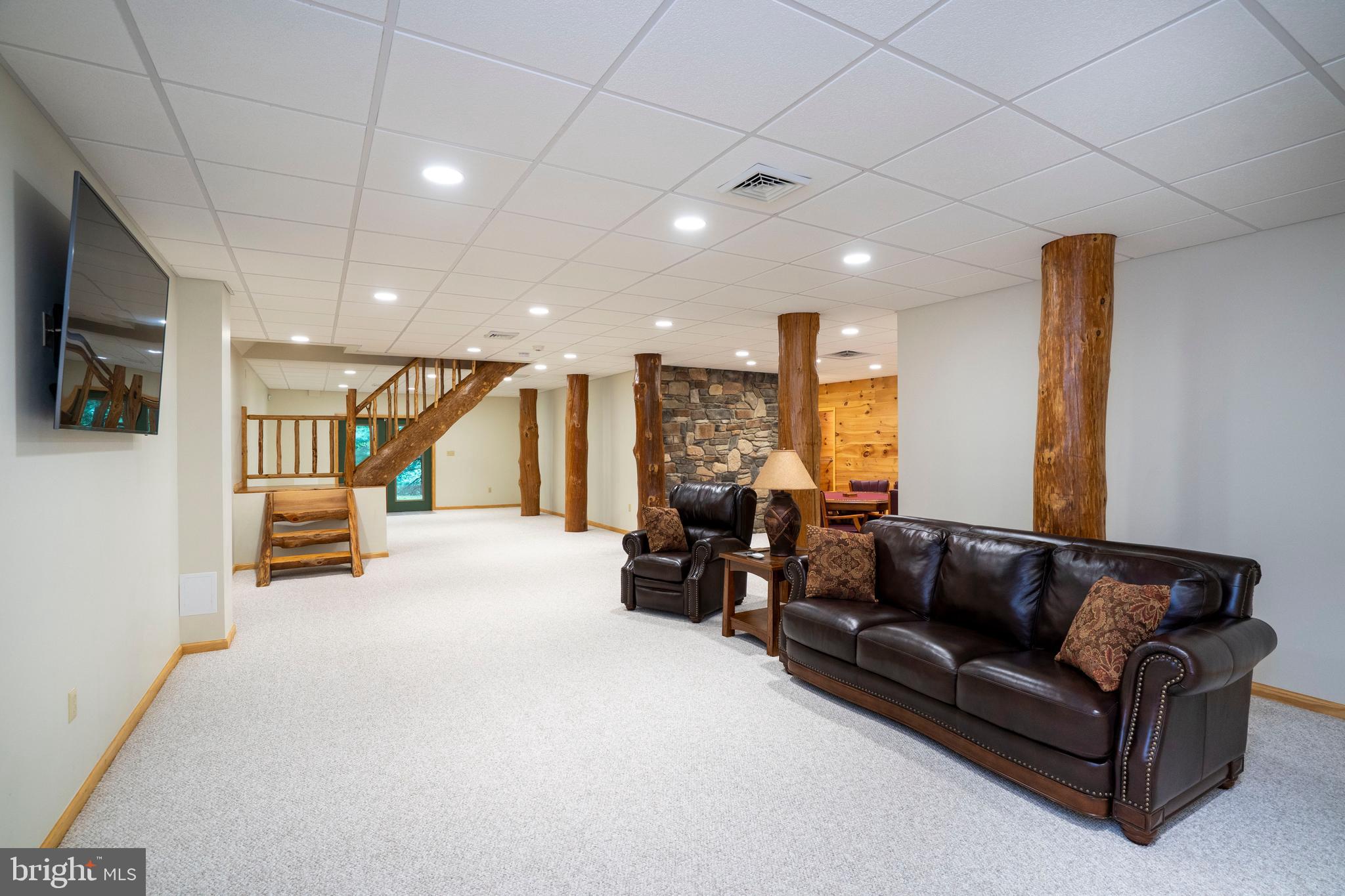1400 Jacks Mountain Road McVeytown, PA 17051 - Photo 92 of 129 a living room with furniture and a flat screen tv