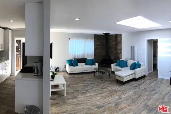 a living room with furniture and a couch